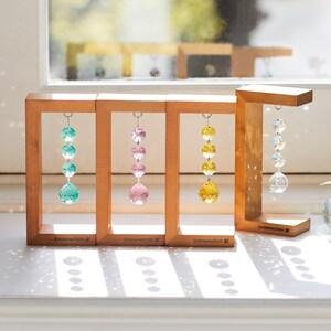 スワロフスキーの木製スタンドサンキャッチャーの商品写真