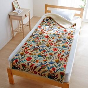 北欧調デザインの内側ボアもこもこあったかつつ毛布┣R┫の商品写真