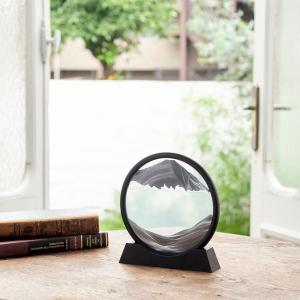 色の異なる砂が不規則の模様を繰り出すサンドピクチャーの商品写真