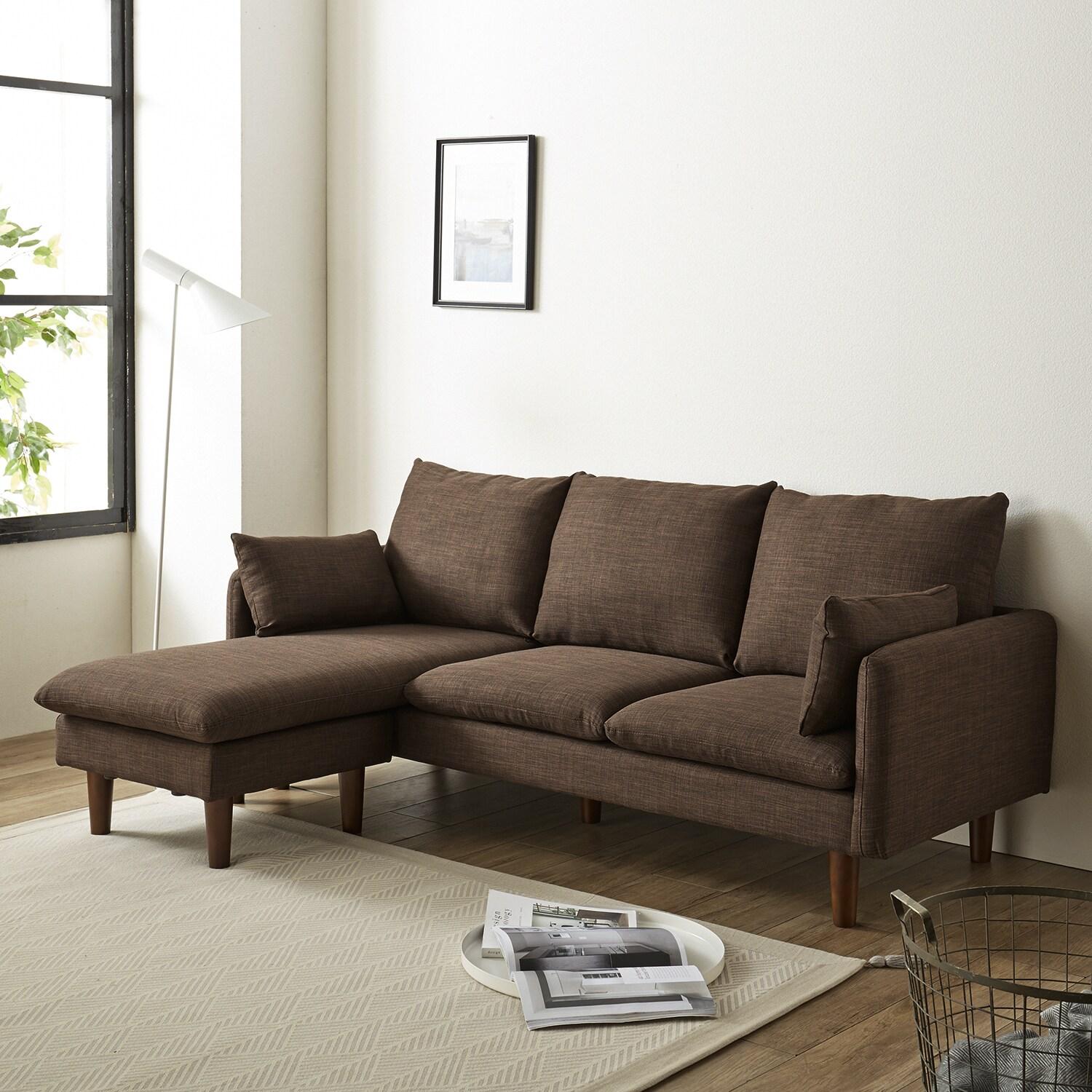 お部屋になじみやすいクッション付きカウチソファーの商品写真