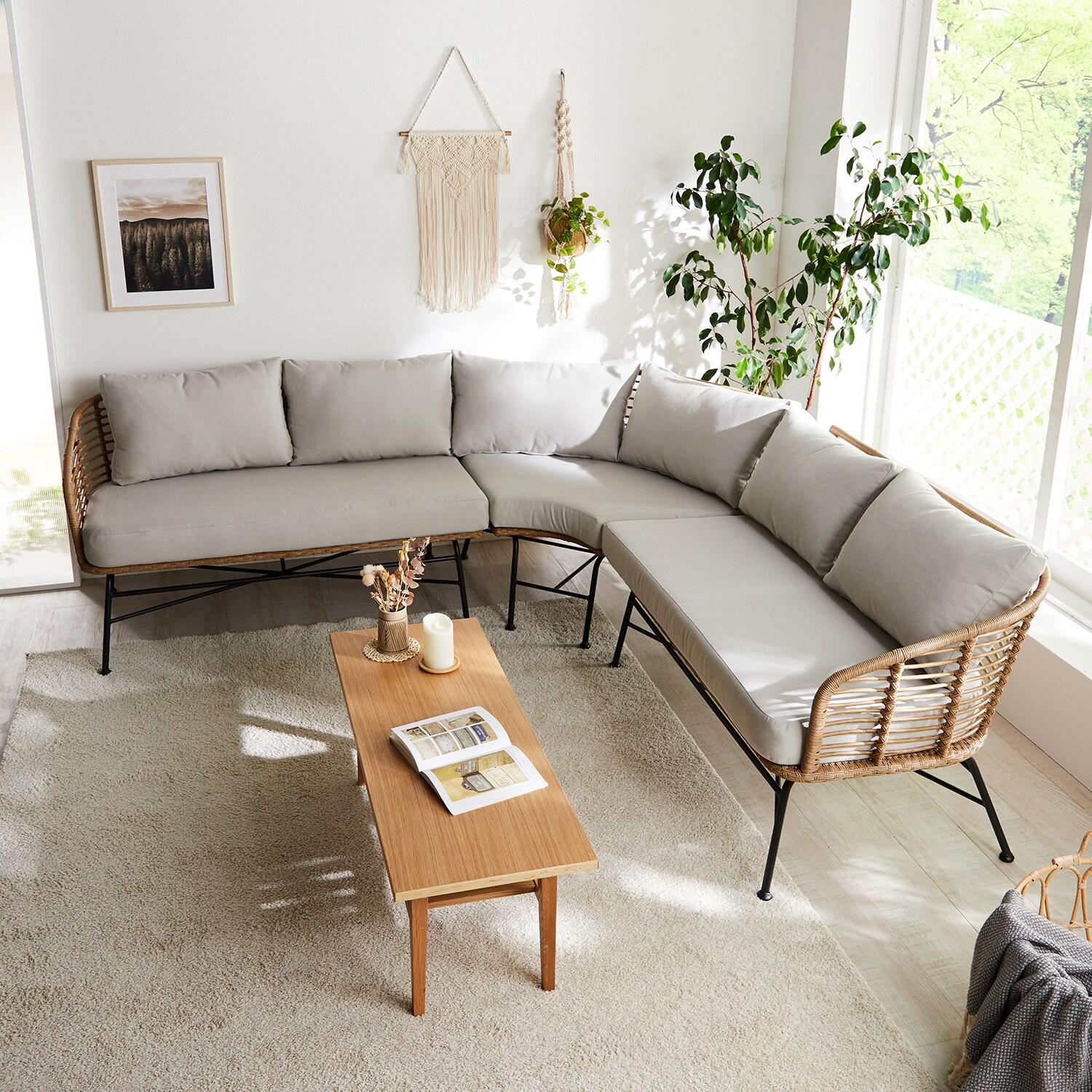 コーナーにおけるラタンデザインの組み合わせソファーの商品写真